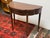 Design Plus Gallery presents a Federal Style Inlaid Cherry Wood Flip Top Console Table from Henkel Harris. This is a...