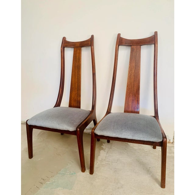 The fantastic curves and lines of these mid-century modern, occasional chairs will be the first thing that catches your...