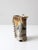 Handmade vintage studio pottery vase with a sculptural silhouette and richly layered glaze in earthy brown, blue, gray,...