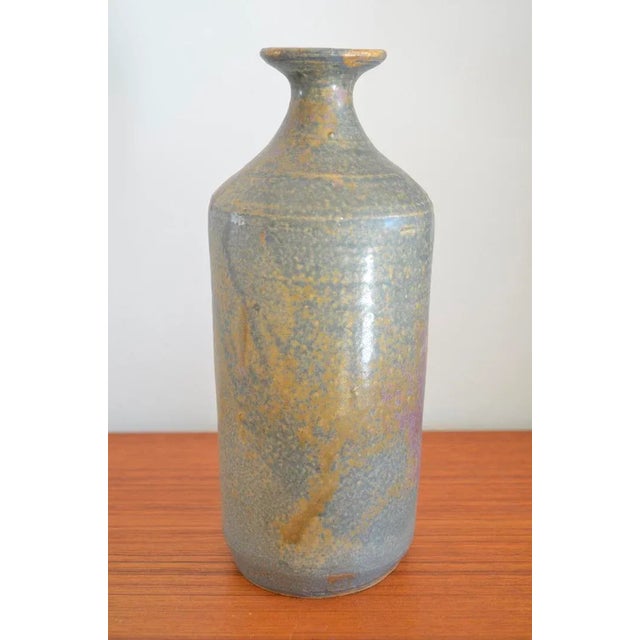 Studio ceramic vase from the workshop of Elke & Elmar Kubicek Münstermaifeld. The ceramics has a natural glaze typical for...