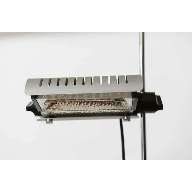 This very high style Italian Alogena vintage Joe Colombo for Oluce adjustable floor lamp has different heights for the...