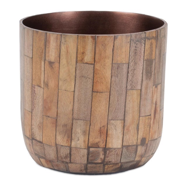 Enhance your indoor space with the Round Wooden Planter Set. Featuring natural brown tones and beautiful wood grain...