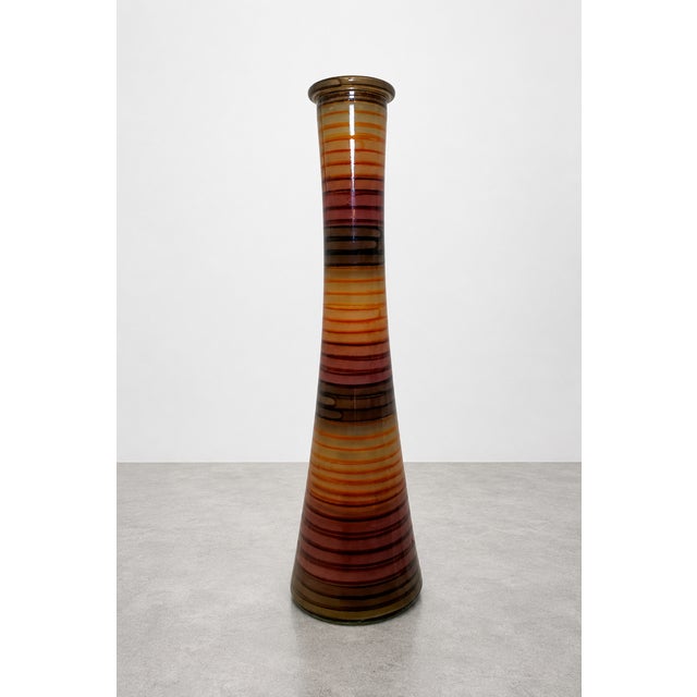 Vintage mid century Spanish multicolored striped tall vase. Very thick glass, with stripes of brown, orange and green’s.