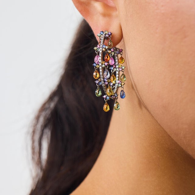 These beautiful contemporary diamond and multicolored stone hoop earrings are a lively 2010’s design, featuring 94 round...