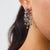 These beautiful contemporary diamond and multicolored stone hoop earrings are a lively 2010’s design, featuring 94 round...