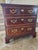 Beautiful Chippendale 3 drawer nightstand made of solid wood with burl mahogany veneers made by Henredon from their Aston...
