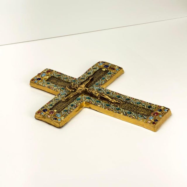 An elaborately decorated Byzantine-style ceramic crucifix by French ceramic artist Marc Roussel, created in Vallauris in...