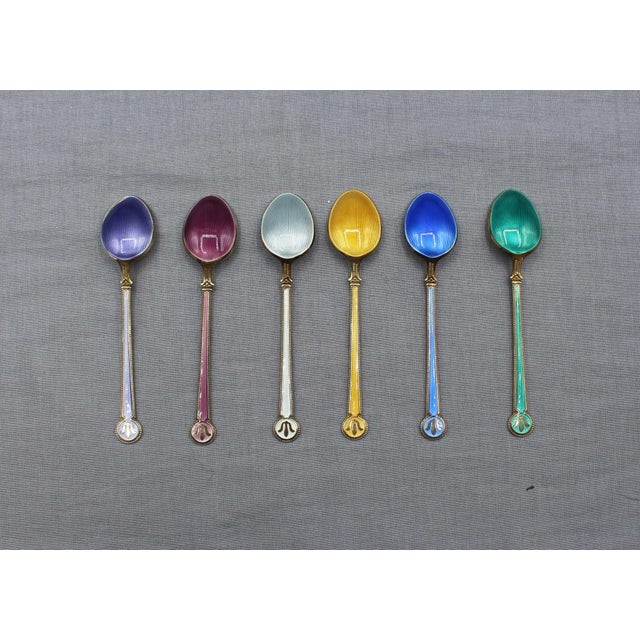 Mid-20th century set of 6 gilt sterling & enamel demitasse spoons by David Andersen, Norway. Incredibly elegant design of...