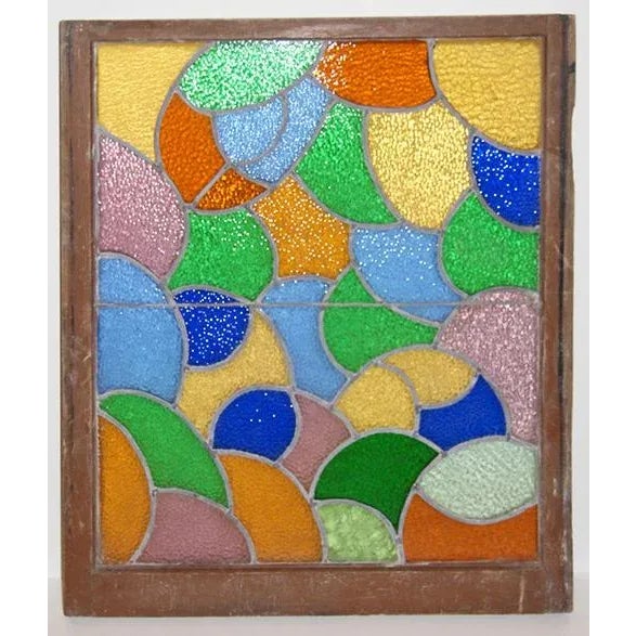 Vintage 1930s stained and textured leaded glass window of unique abstract design. Vivid polychrome glass done in shades of...