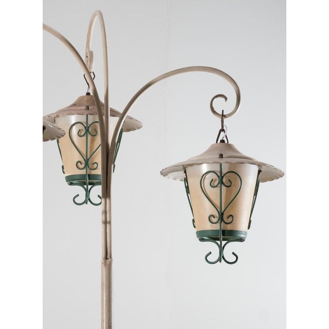 Elegant white metal garden lamp dating back to the 1940s. The lamp was recovered from the garden of a villa near Ravello...