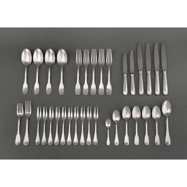 Christofle Silver Plate Assembled Flatware Service, comprising: in the "Chinon" pattern, one (1) luncheon fork, five (3)...