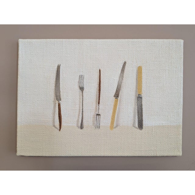 KNIVES AND FORKS NO.3 Size: 11.8 x 16.7 inches Oil on canvas Bristol-based artist Brendan Lancaster finds interest in the...
