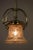 This Art Nouveau pendant dates from circa 1908 and retains the original glass shade. European Plug (up to 250V).The wiring...