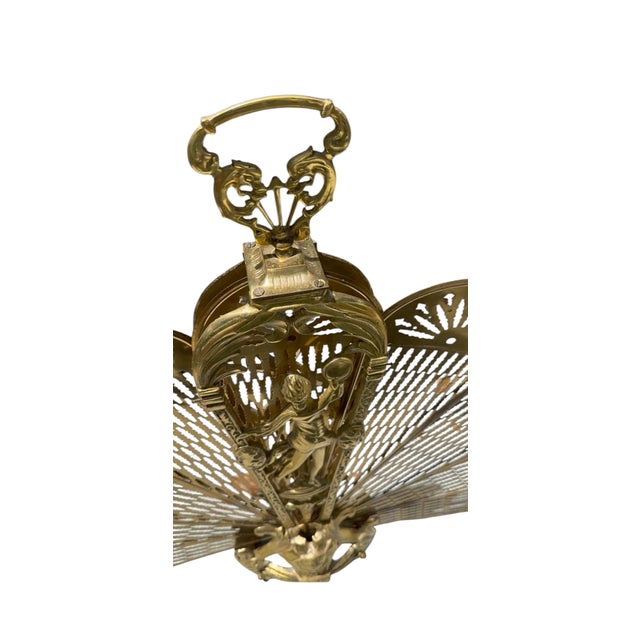 Vintage Art Deco Figural Brass Peacock Folding Fireplace Screen, Circa 1925. An exceptional early 20th-century Art Deco...