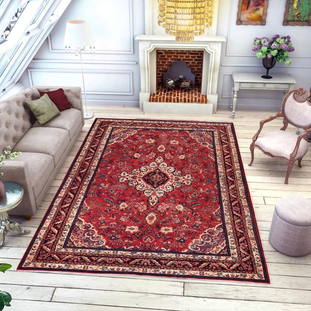 Hand knotted by skilled artisans from 100% wool and colored with all-natural vegetable dyes, this vintage antique-style...