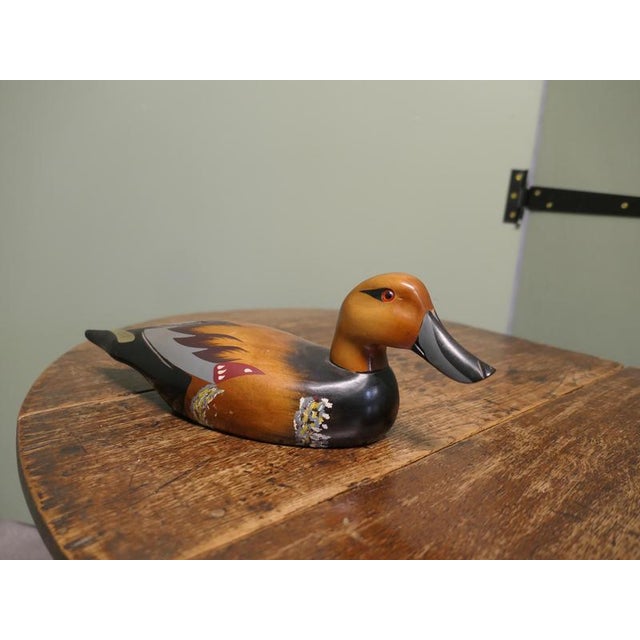 This is a good 20th Century Ornamental Duck, he is carved and his feathers and features are painted in attractive detail,...