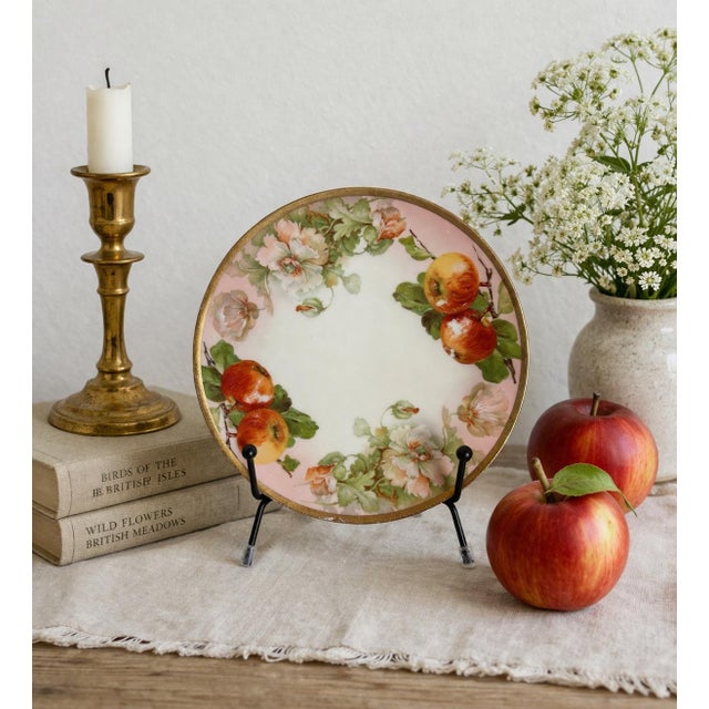 A charming antique Prussian porcelain cabinet plate by Royal Rudolstadt, featuring hand-painted apples and soft botanical...