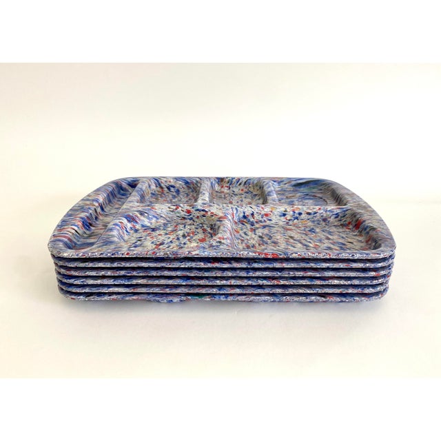 A nostalgic cross between carnival "spin art" and the cafeteria lady, these Melamine divided trays in red, white and blue...