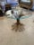 Timelessly glamorous gilt metal wheat sheaf motif end tables having new thick tempered glass tops. Details Dimensions...