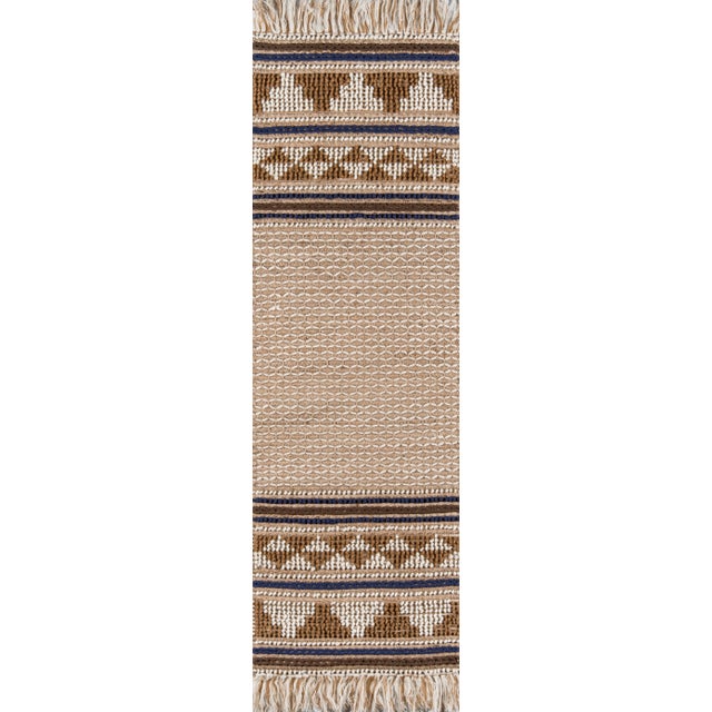 Humble materials meet high-fashion aesthetic in the luxe fabrication of this modern area rug collection. The inspired...