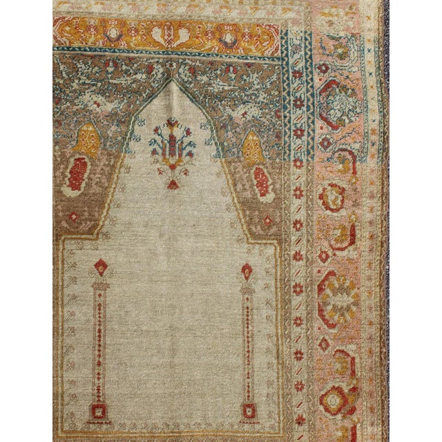 Antique Turkish Sivas prayer rug with floral design in ivory, taupe, and pink, Keivan Woven Arts / rug d-1007, country of...