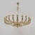 An important Italian chandelier from the 1950s, crafted from solid brass and featuring an imposing structure composed of...