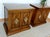 Beautiful matching pair of vintage Unique Furniture Bolero II nightstands featuring carved walnut cabinet doors, original...