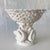 This graceful white ceramic reticulated bowl would make an elegant fruit bowl, decorative tabletop centerpiece, or a blanc...