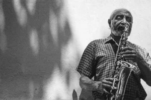 The Sax Man Framed Black and White Photograph