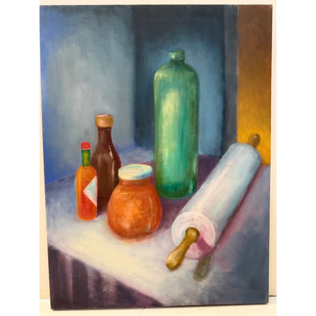 A charming vintage still life featuring a collection of everyday objects—including bottles, a jar, and a rolling...