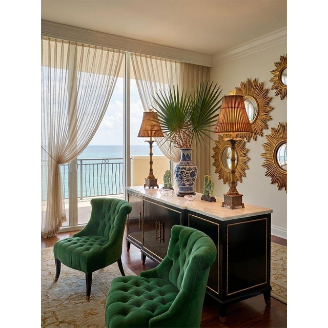 Offering a vintage pair of palm tree lamps with bamboo style tree trunks and real bamboo lamp shades, circa Late 20th...