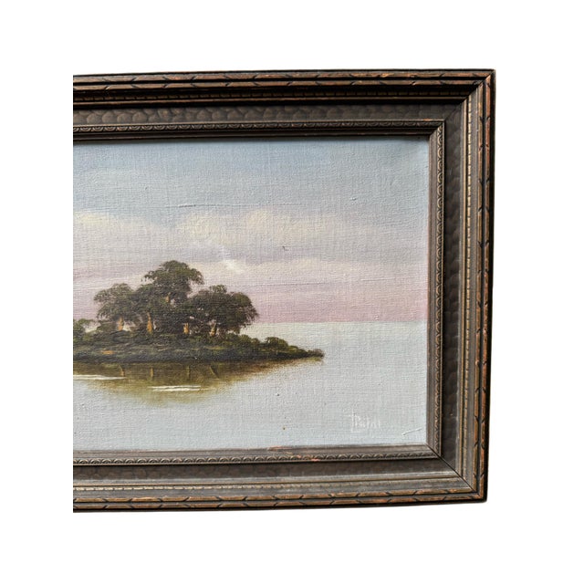 This antique landscape painting features a serene composition with shades of purple and blue in the sky, complemented by...