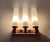 Vintage Kaiser wall light featuring a copper and white enameled base and fluted opaline glass shade Dimensions: Height 25...