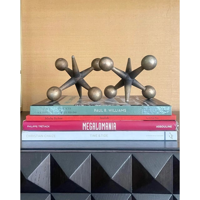 Pair of wonderful vintage, sculptural, bronze and brass mid-century jacks in the style of Bill Curry. Perfect for a desk...