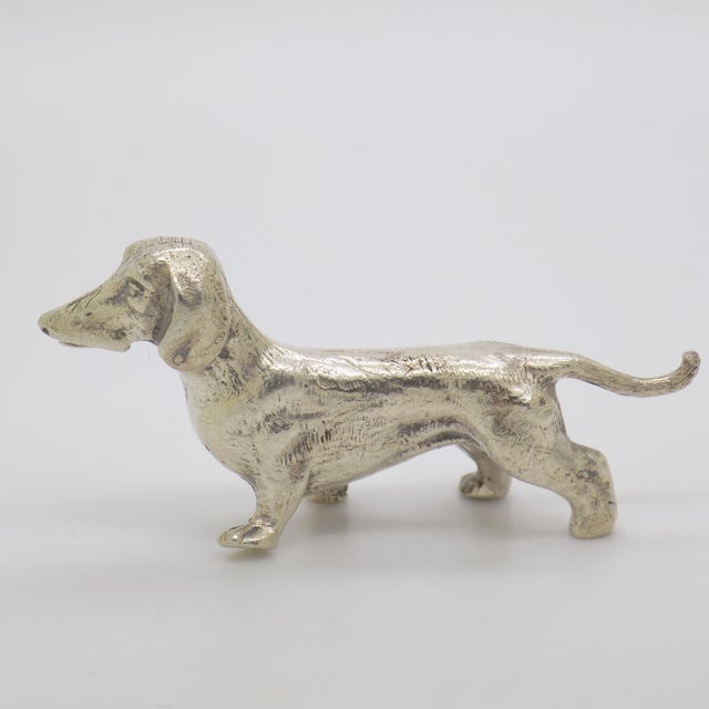 This vintage silver figurine depicts a Dachshund sausage dog. Handcrafted in Italy during the 1950s to 1960s in solid 800...
