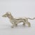 This vintage silver figurine depicts a Dachshund sausage dog. Handcrafted in Italy during the 1950s to 1960s in solid 800...
