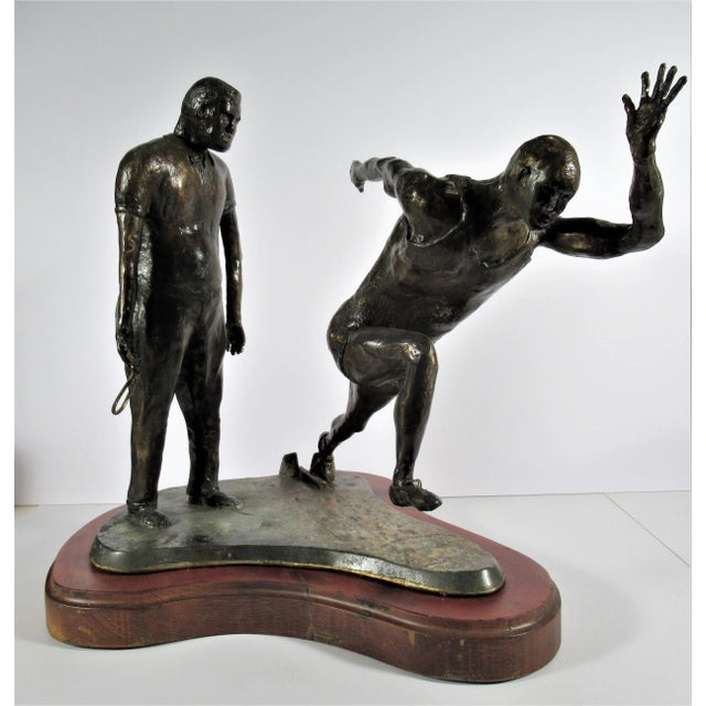 This artwork Titled "The Athlete and his Coach" is a bronze sculpture by noted California artist Kenneth Johnson, born...