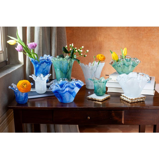 Mouthblown in Italy, the Onda Glass Petite Ruffled Round Bowl makes a sophisticated statement on its own or as part of a...