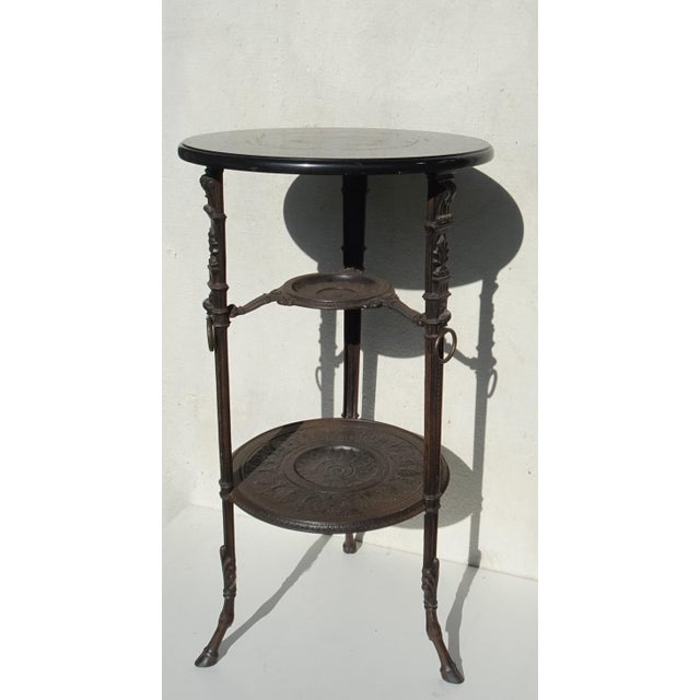 Antique Cast Iron Side Table with Black Marble Top by E.G. Zimmermann, Hanau, 1890s, in Good conditions. Designed 1890 to...