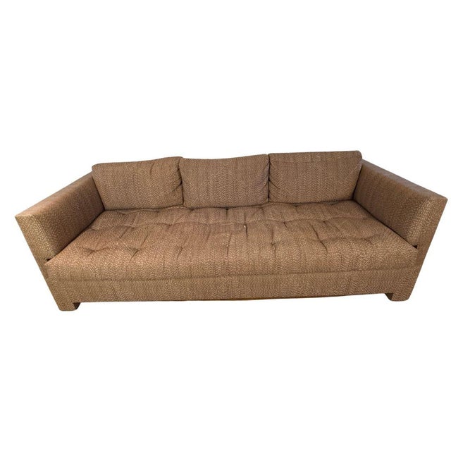 Custom upholstered sofa inspired by the clean-lined, mid-century modern designs of Milo Baughman. Upholstered in a mocha...