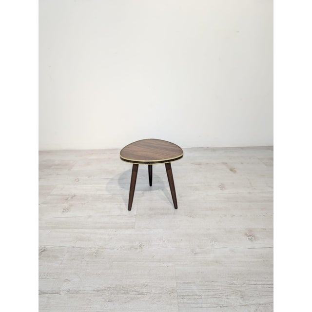 An original table from the Polish People's Republic era in the iconic "patyczak" style, characteristic of the design of...