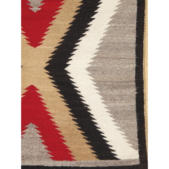 Rhythm of the Four Directions: A Mid-20th Century Navajo Chevron Rug, Handmade For Sale - Image 15 of 18