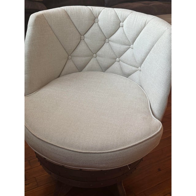 Beautiful swivel barrel accent chair in excellent condition. This chair features a unique wine barrel-inspired wood...