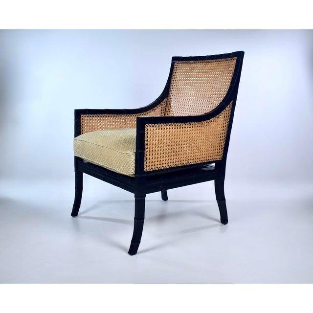 A substantial double-caned Beaufort Chair from Hickory Chair with faux Bamboo styling and black lacquer finish, plush...
