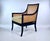 A substantial double-caned Beaufort Chair from Hickory Chair with faux Bamboo styling and black lacquer finish, plush...