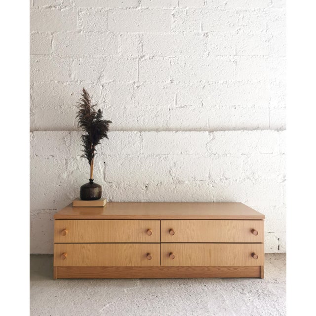 This lowboard with ample storage space was made in Germany in the 1960s. High-quality craftsmanship in a minimalist,...
