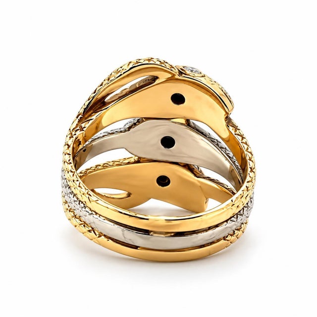 Fine estate two-tone gold serpent snake ring designed with a striking multi-band triple roll / bypass motif. The yellow...