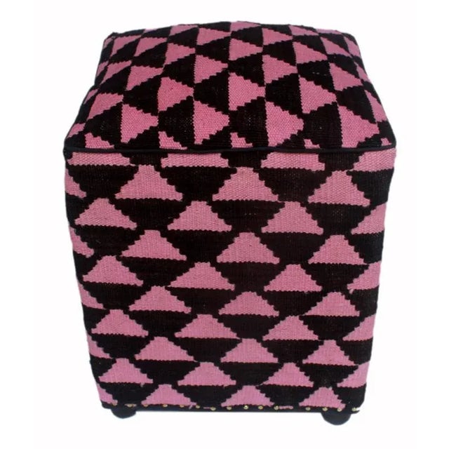 Chic handmade ottoman crafted using wood and upholstered using hand-woven kilim wool rug is a multi-purpose fashion pouf...