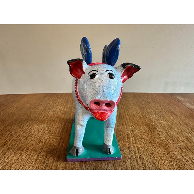 A delightful handcrafted ceramic winged pig piggy bank from the celebrated pottery region of Tonalá, Jalisco, Mexico. This...