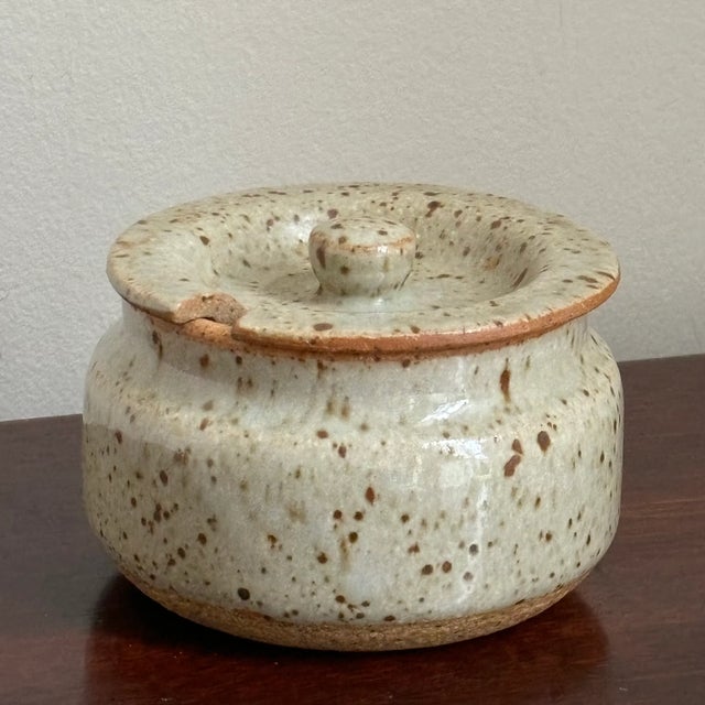 A beautiful example of work done in a studio setting. Love the elegant form of this highly functional lidded bowl and its...